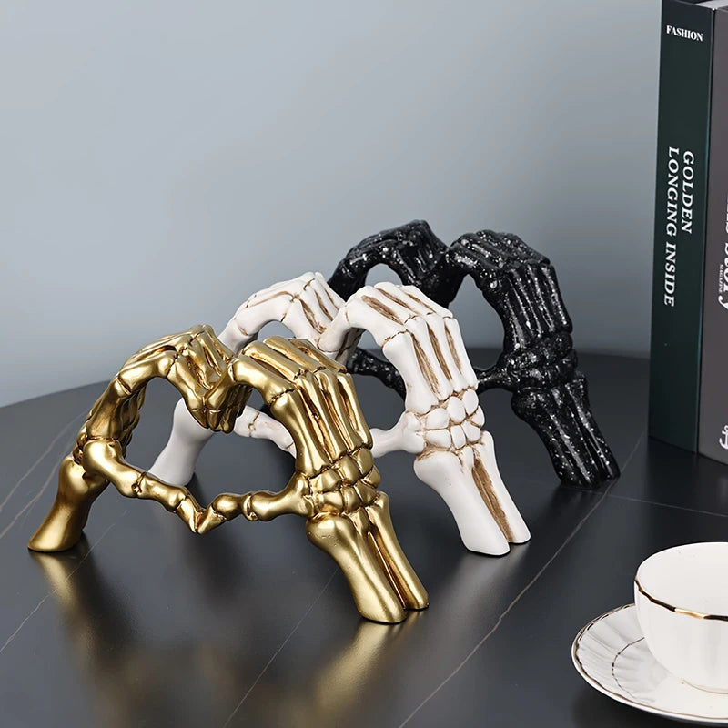 Decorative sculpture of hands forming a heart shape 