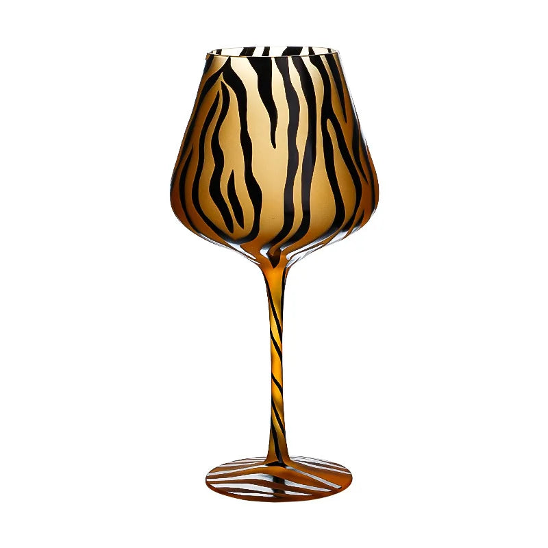 Wine glass with zebra pattern on a white background