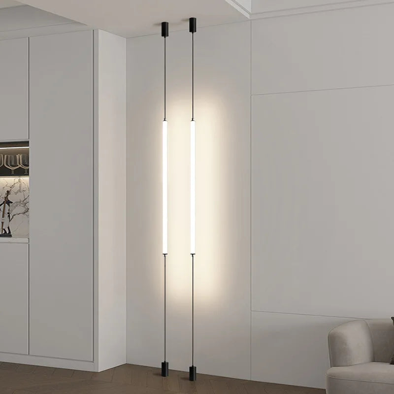 Modern floor lamp with a minimalist design in a neutral-colored room.