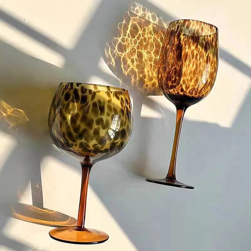 Two leopard print wine glasses 