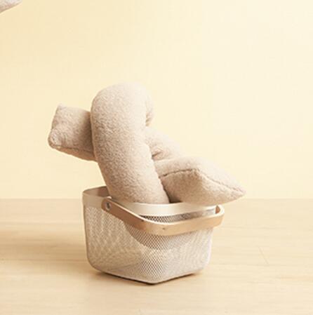 cream abstract design couch cushion